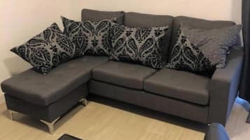 Departamento, 2 habitaciones, para fumadores, balcón | Área de sala de estar