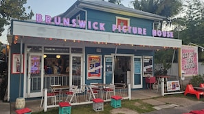 A building with a sign that reads 'BRUNSWICK PICTURE HOUSE.' - Welcome to Casablanca, a stylish cottage perfectly positioned in the Heart of Bruns (BRUNSWICK HEADS)