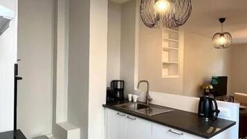 Deluxe-huoneisto, kaupunkinäköala | Yksityinen keittiö
