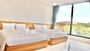 Habitación triple Deluxe | Escritorio, insonorización y wifi gratis 