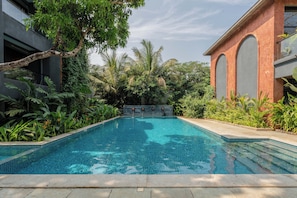 Outdoor pool, open 8:00 AM to 8:00 PM, pool umbrellas, sun loungers