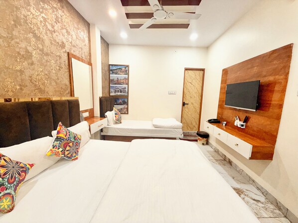 Premium bedding, desk, laptop workspace, free WiFi