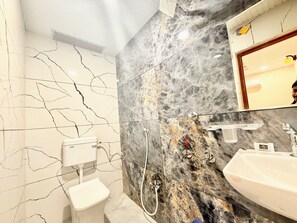 Superior Triple Room | Bathroom | Shower, rainfall showerhead, bidet, soap