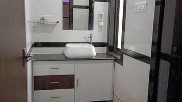 Shower, towels, soap, toilet paper