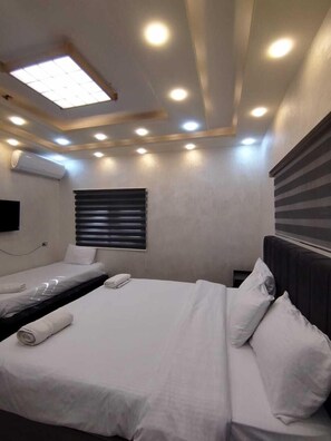 Comfort Triple Room, City View | Individually decorated, individually furnished, laptop workspace - hadrian's arch (Jerash)