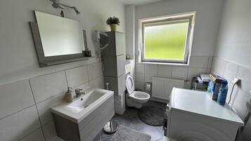 Hair dryer, towels, soap, toilet paper