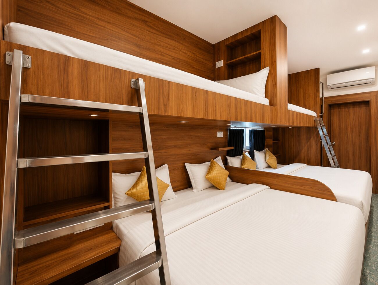 A bunk bed room with wooden walls, a ladder, and a small shelf.