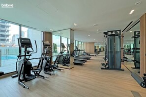 Fitness facility - bnbme | Modern Studio in JVC w/ Pool & City View (Dubai)