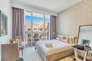 Iron/ironing board, WiFi, bed sheets - bnbme | Studio in JVC Dubai | Rooftop Pool & Gym Access (Dubai)
