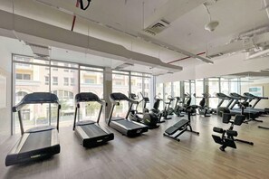 Fitness facility - bnbme | Studio in JVC Dubai | Rooftop Pool & Gym Access (Dubai)