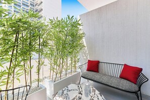 Terrace/patio - bnbme | Chic JVC Studio | Pool, Gym & Serene Retreat (Dubai)