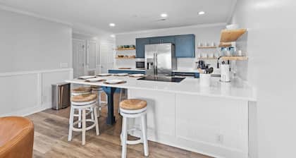 Enjoy ocean views in this 2-bedroom condo at Oak Island, perfect for 6 guests.