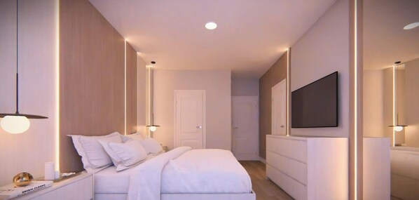 Un dormitorio moderno con una cama, mesita de noche y televisión montada en la pared.