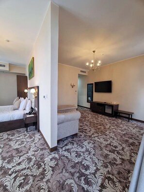 Superior Suite, Balcony, City View | In-room safe, desk, laptop workspace, blackout drapes