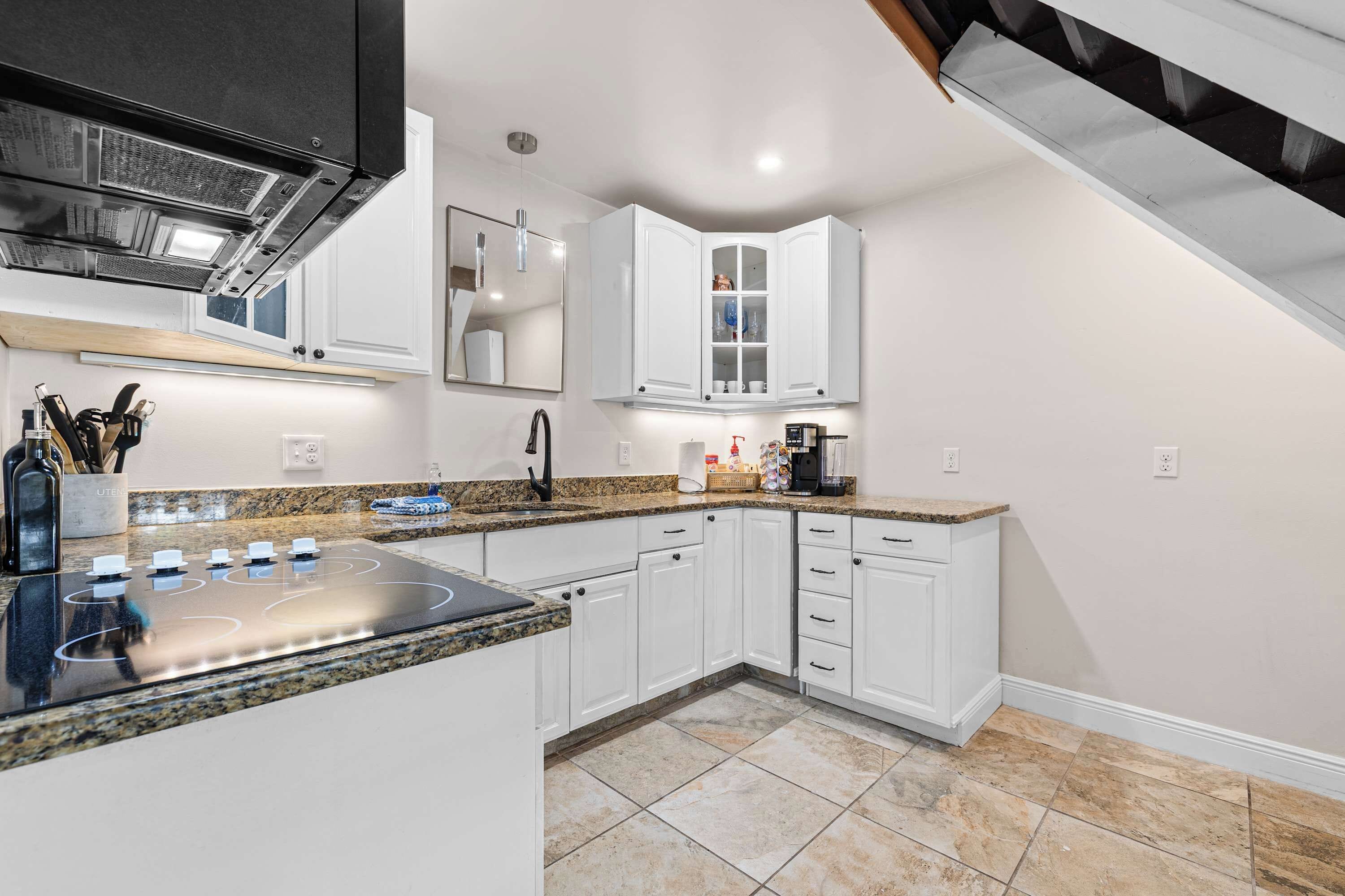 Fridge, microwave, stovetop, coffee/tea maker