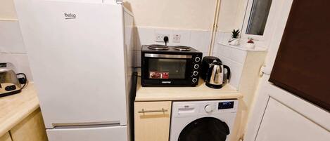 Fridge, microwave, coffee/tea maker, toaster