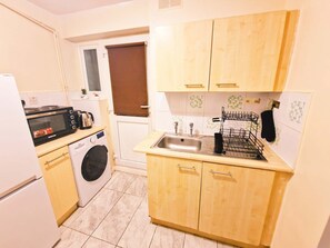 Fridge, microwave, coffee/tea maker, toaster