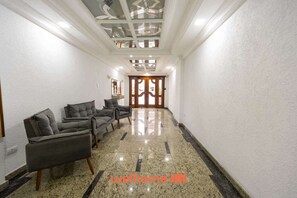 Lobby - Apartamento na Praia do Forte com vista mar (Praia Grande)