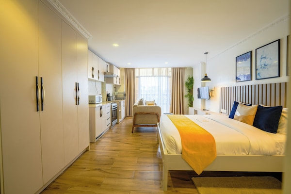 Desk, laptop workspace, free WiFi, bed sheets