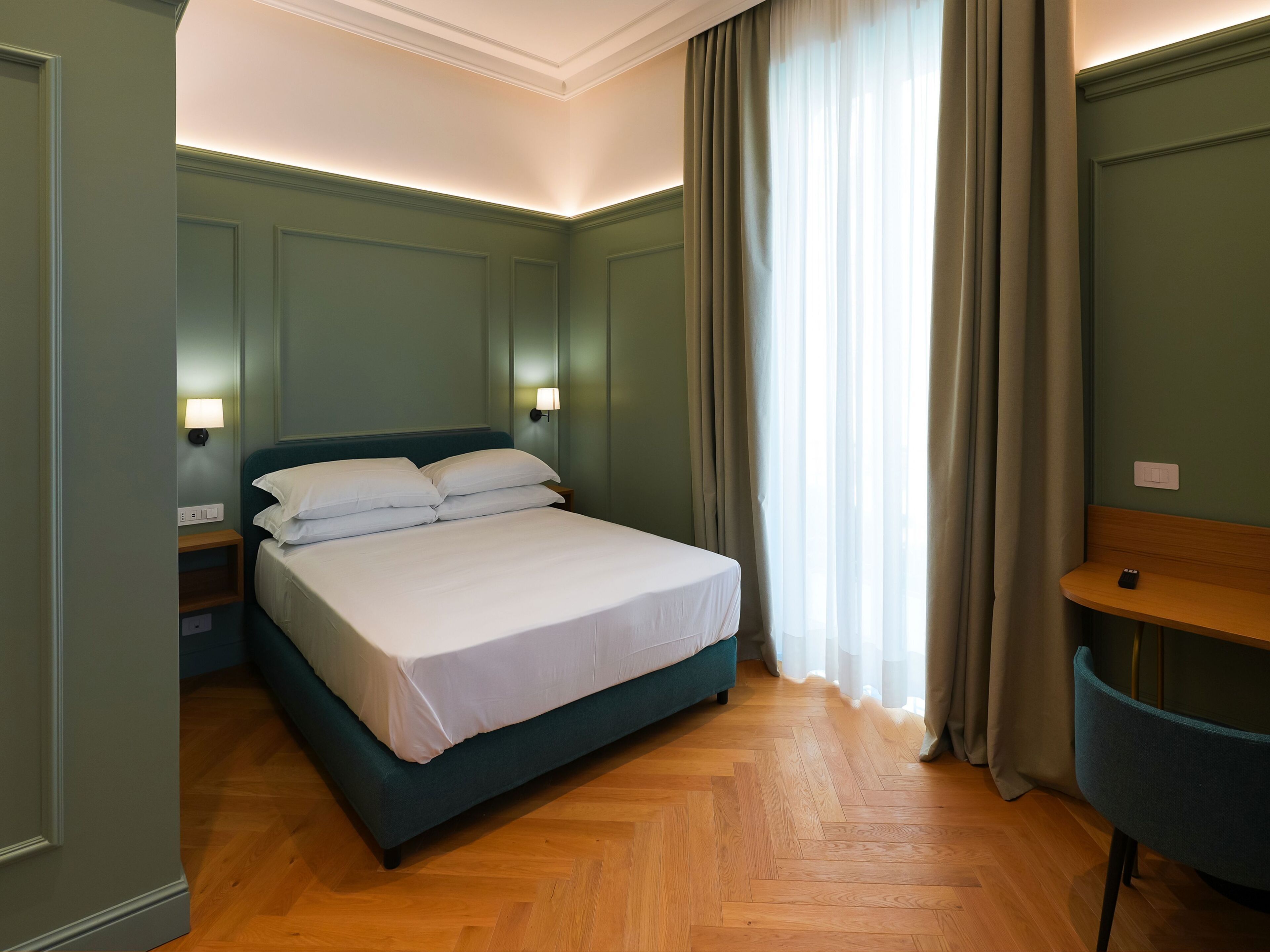 Deluxe Double Room, Balcony, Garden View | In-room safe, desk, free WiFi