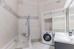 Shower, hair dryer, shampoo