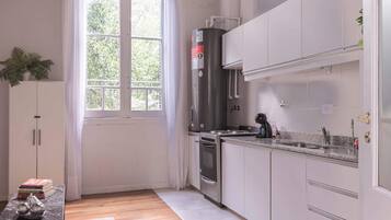 Microwave, coffee/tea maker, toaster, cookware/dishes/utensils