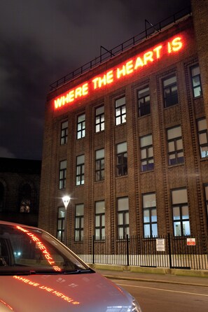 A building with a sign that reads "WHERE THE HEART IS". - Student Only Algernon Firth (Leeds)