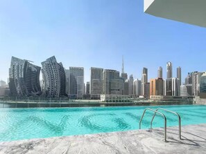 Apartment, 1 Bedroom, Accessible, Smoking | Pool | Outdoor pool - Dubai Canal Dream, Iconic Burj Views With Large Balcony Sleeps 4 (Dubai)