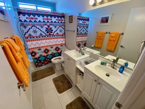 Shower, hair dryer, towels, soap
