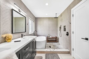 Shower, hair dryer, towels, shampoo
