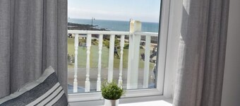 Spacious Modern Apartment with Sea Views in Prime Beachside Location