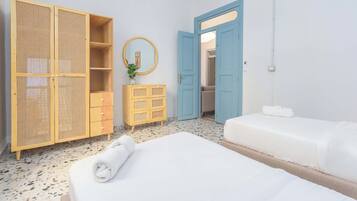 Apartment, 3 Bedrooms, Kitchen, City View | Desk, laptop workspace, blackout drapes, iron/ironing board