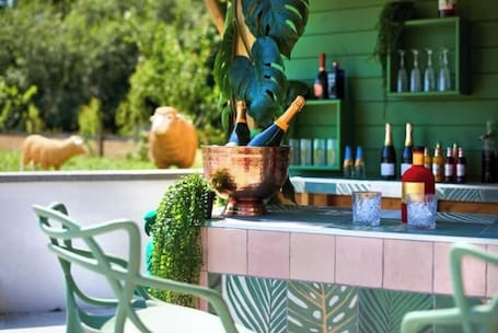 Bar (on property). The Forge - Rustic Retreats