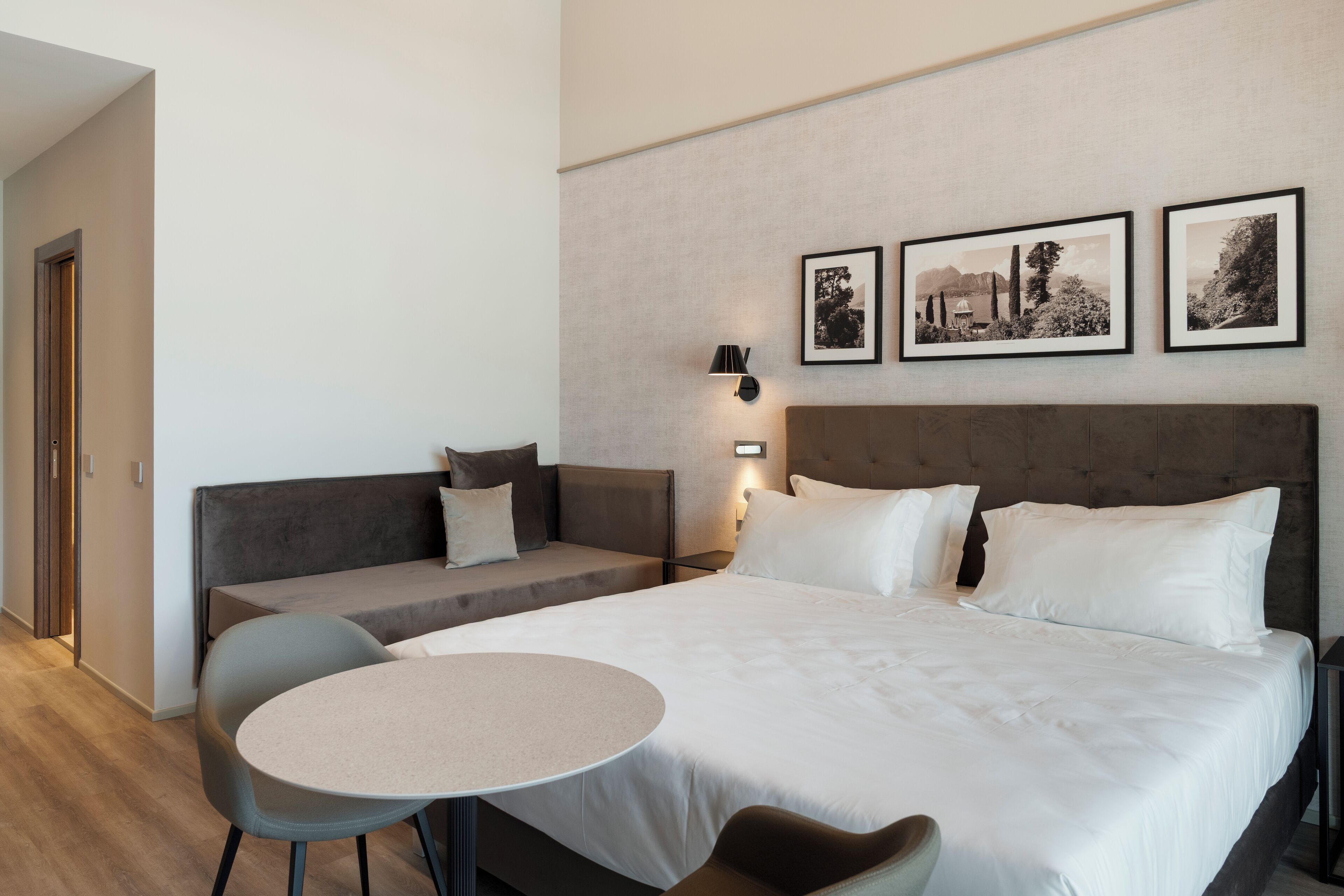 Superior Triple Room, Lake View | Minibar, in-room safe, blackout drapes, soundproofing