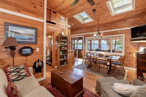 TV, fireplace - Waterfront Sunset Winnipesaukee Cottage (Laconia)