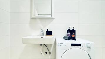 Hair dryer, towels, soap, shampoo