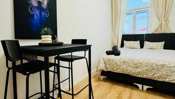 1 bedroom, desk, bed sheets