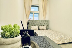 1 غرفة نوم وملاءات أسرّة