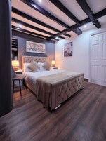 Blackout drapes, iron/ironing board, free WiFi, bed sheets