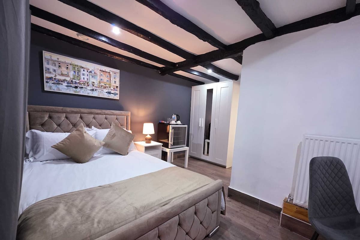 Blackout curtains, iron/ironing board, free WiFi, bed sheets