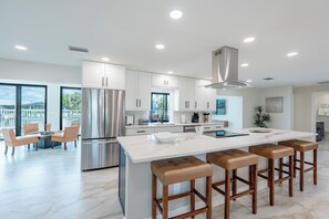 Fridge, microwave, oven, stovetop - ☀️Private Pool | Canal Front with Boat Dock | Seas The Day☀️ (Fort Myers Beach)