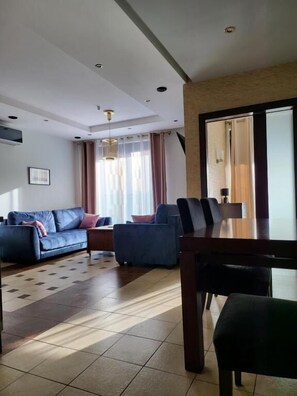 Deluxe Suite, Balcony, City View (APS108) | Blackout drapes, iron/ironing board, free WiFi