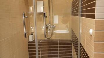 Deluxe Suite, Balcony, City View (APS108) | Bathroom | Hair dryer, towels, soap, shampoo