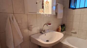 Hair dryer, towels, soap, toilet paper