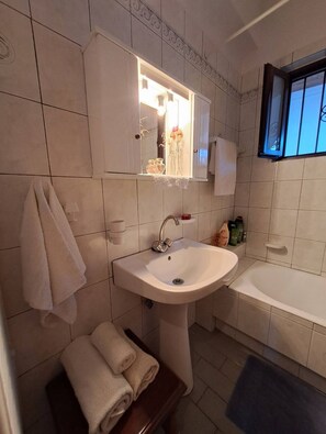 Hair dryer, towels, soap, toilet paper