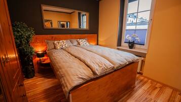 1 slaapkamer, een strijkplank/strijkijzer, wifi, beddengoed