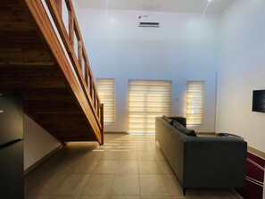 Dúplex básico, vistas al jardín | Zona de estar