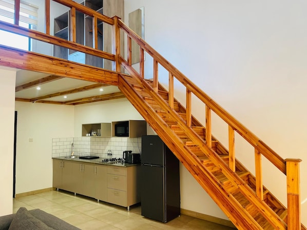 Dúplex básico, vista al jardín | Área de sala de estar