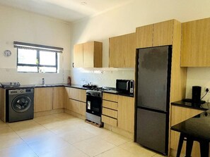 Classic Apartment, 2 Bedrooms, Garden View | Private kitchen | Fridge, microwave, cookware/dishes/utensils