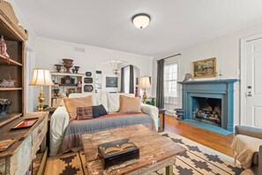 Smart TV, fireplace, books, video library